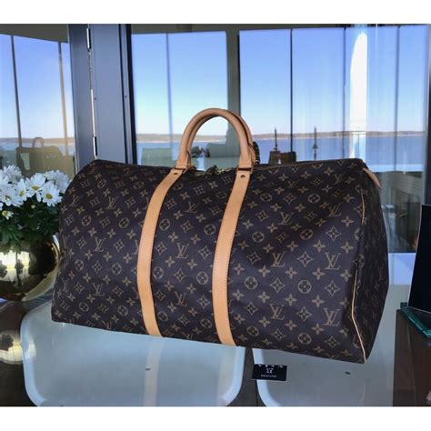 louis vuitton titanium keepall|keepall 55 Louis Vuitton.